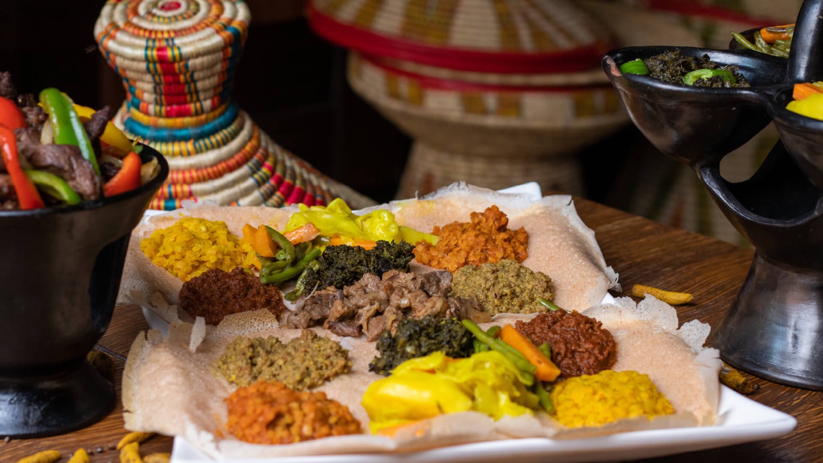 An injera platter with Ethiopian stews at Habesha