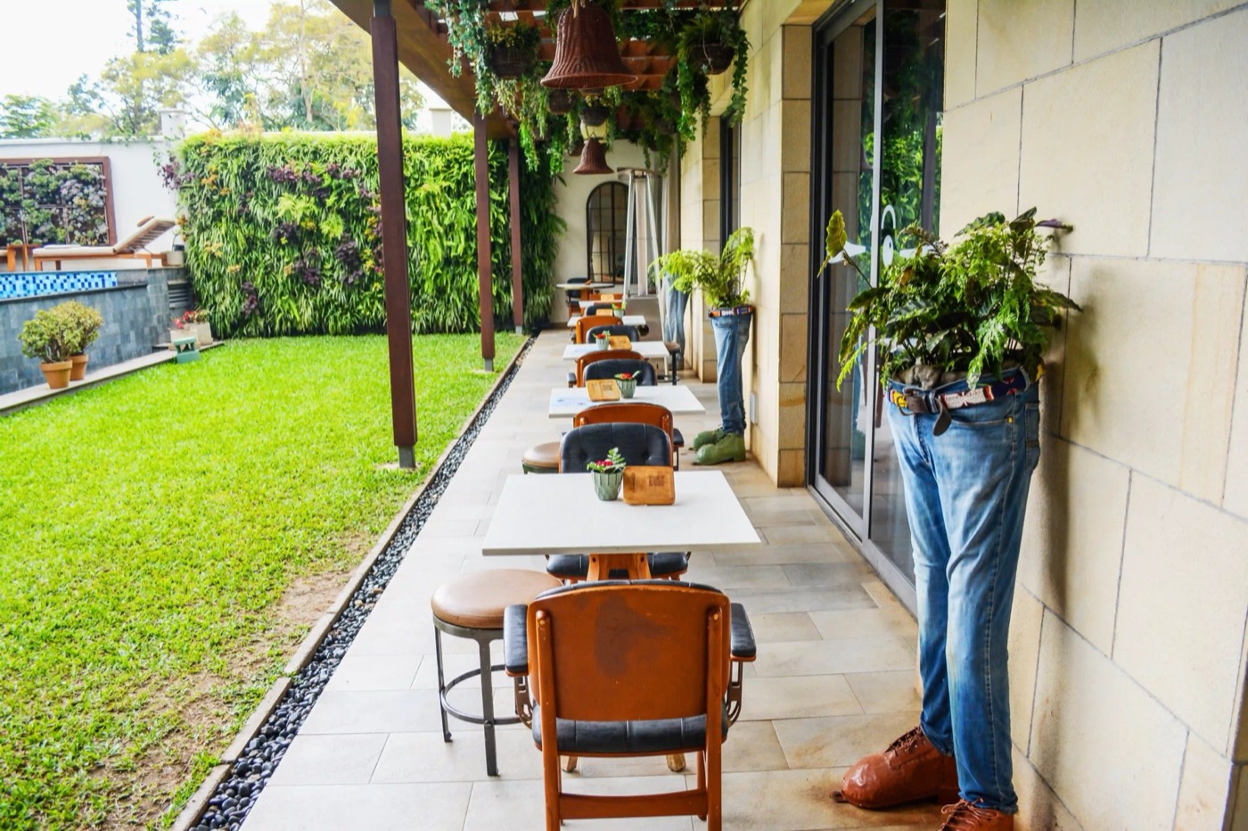 The Other Room garden terrace beside the lawn